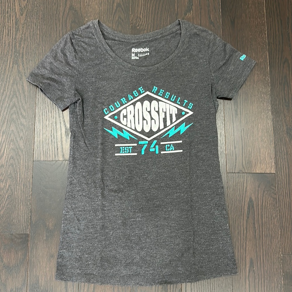 REEBOK Women’s T-shirt | Size M